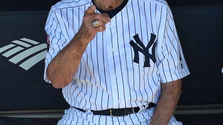 Former New York Yankees player Eddie Robinson looks on from the dugout during the 70th annual Old-Timers' Day at Yankee Stadium on Sunday, June 12, 2016.
