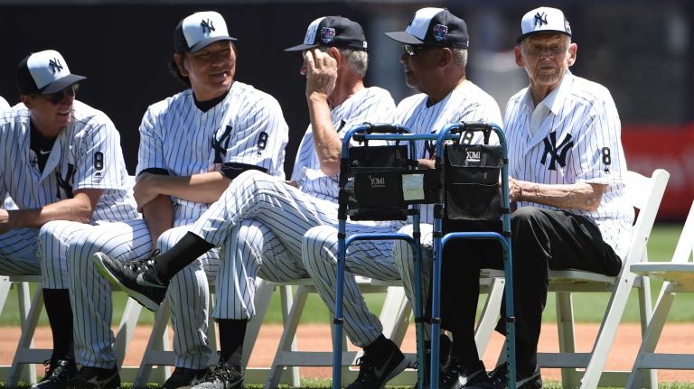 Former New York Yankees players including Don Larsen, right, look on from the field during the 70th annual Old-Timers' Day at Yankee Stadium on Sunday, June 12, 2016.