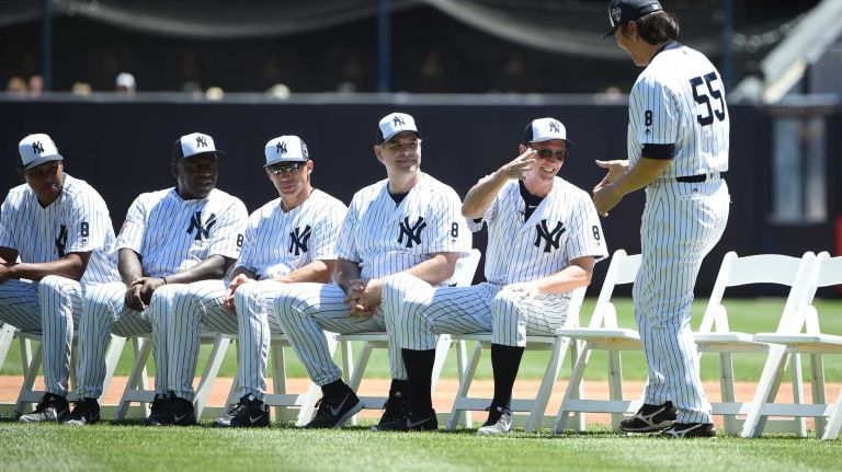 Former New York Yankees player David Cone greets Hideki Matsui during the 70th annual Old-Timers' Day at Yankee Stadium on Sunday, June 12, 2016.