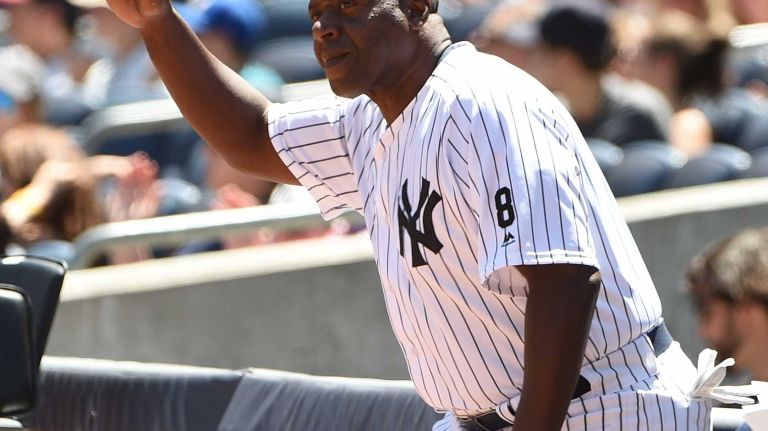 Former New York Yankees player Charlie Hayes tips his cap to fans during the 70th annual Old-Timers' Day at Yankee Stadium on Sunday, June 12, 2016.