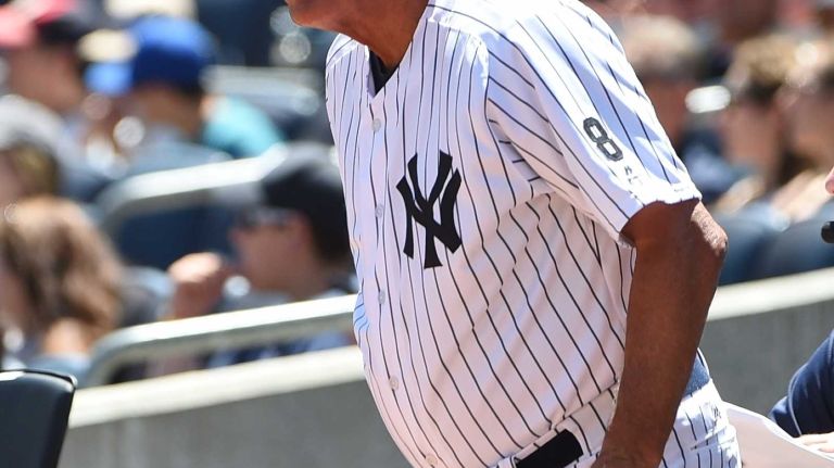 Former New York Yankees player Lou Piniella is introduced from the dugout during the 70th annual Old-Timers' Day at Yankee Stadium on Sunday, June 12, 2016.