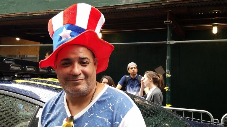 Salvador Varela of Hempstead, whose family is in Puerto Rico, gets ready for the 61st annual National Puerto Rican Day Parade.