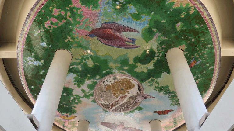 The next time you find yourself in the Myrtle-Wyckoff avenues station in Brooklyn, be sure to walk up to the top where the M train is located and look up. There, you will find a beautiful mosaic made of ceramic, glass and marble covering the circular ceiling. Cadence Giersbach's 