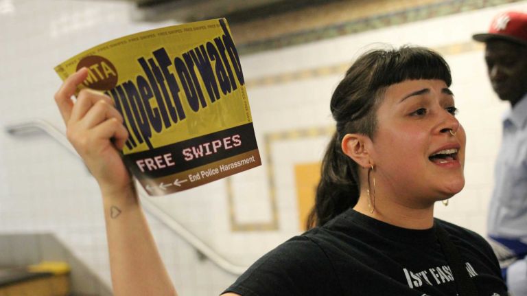 Free subway rides: See photos of protesters in Crown Heights 6 Julieta Salgado, of Ice-Free NYC, invites commuters to take advantage of a free MetroCard swipe at the Crown Heights-Utica Avenue subway station on Tuesday, June 7, 2016. Salgado was one of about two dozen activists offering free subway rides as part of