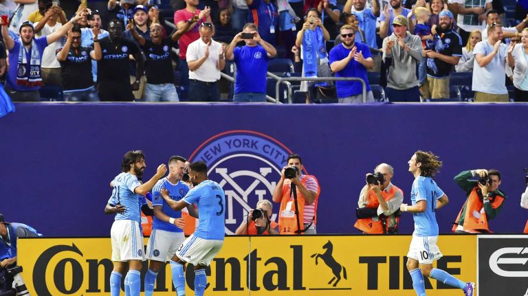 NYCFC vs. Real Salt Lake 28 New York City FC midfielder Jack Harrison (11) is congratulated by his teammates after scoring his second half goal in an MLS game against Real Salt Lake at Yankee Stadium in Bronx, New York on Thursday, June 2, 2016.