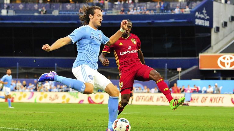NYCFC vs. Real Salt Lake 32 New York City FC midfielder Mikkel Diskerud (10) is defended by Real Salt Lake midfielder Demar Phillips (17) in an MLS game at Yankee Stadium in Bronx, New York on Thursday, Jun 2, 2016.