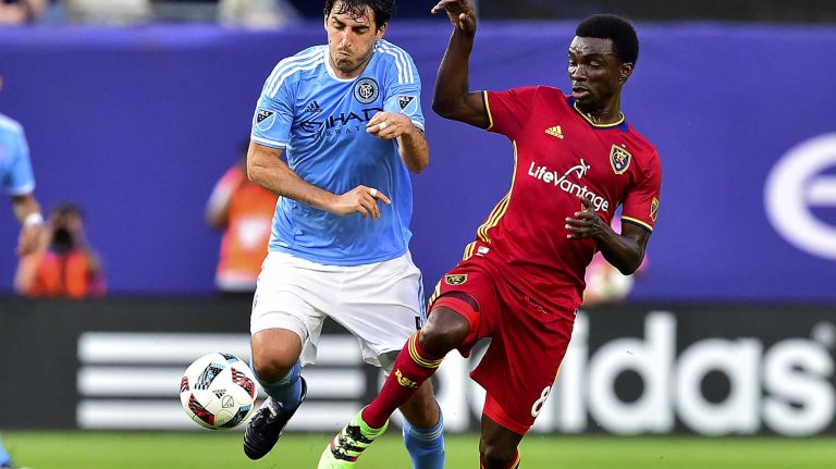 NYCFC vs. Real Salt Lake 36 New York City FC defender Andoni Iraola (51) is defended by Real Salt Lake midfielder Stephen Sunny Sunday (8) in an MLS game at Yankee Stadium in Bronx, New York on Thursday, Jun 2, 2016.