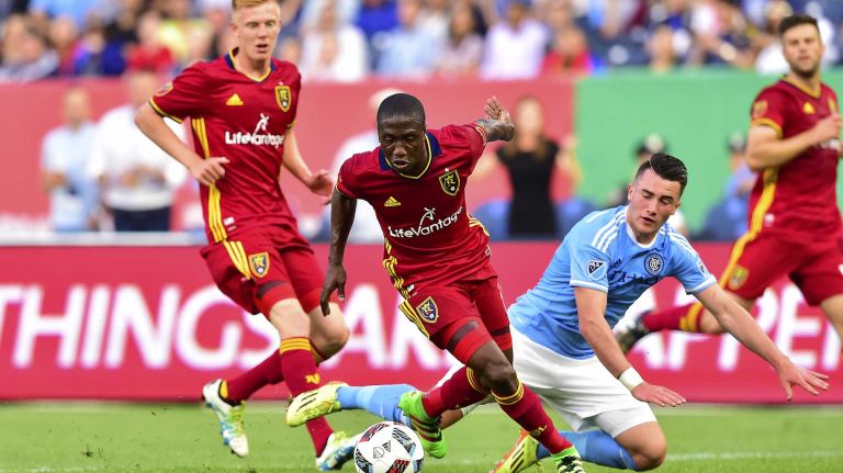 NYCFC vs. Real Salt Lake 48 New York City FC midfielder Jack Harrison (11) loses control as Real Salt Lake midfielder Stephen Sunny Sunday (8) comes away with the ball in an MLS game at Yankee Stadium in Bronx, New York on Thursday, Jun 2, 2016.
