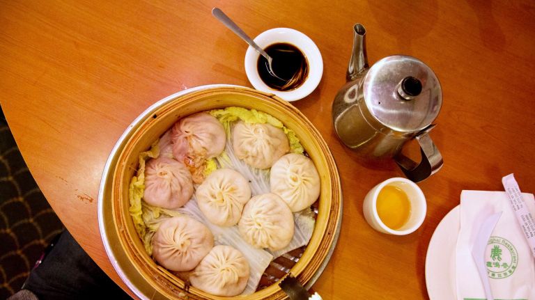 JOE'S SHANGHAI . New York offers no shortage of Chinese dumpling houses, but Joe's Shanghai, with two Manhattan locations (plus one in Flushing, Queens), is the classic destination for soup dumplings, those plump, pinched purses filled with broth and meat. A meal at Joe's is theater for kids: watching the bamboo baskets being shepherded from kitchen to table, letting the steam float up and away, biting off a little piece of dough, noisily slurping down the soup (warn them to watch out, it's hot), devouring the dumpling and its meat. There will be mess. Possibly a burned tongue. But that's part of the experience, too. WHERE 24 W. 56th St. (Midtown), 9 Pell St. (Chinatown) INFO 212-333-3868 (Midtown), 212-233-8888 (Chinatown), joeshanghairestaurants.com Pork soup dumplings served at Joe's Shanghai in Chinatown, Manhattan, May 9, 2016.