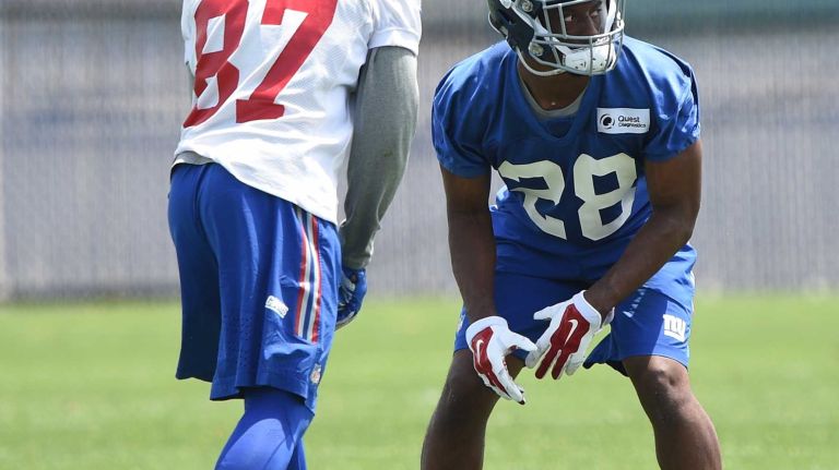 New York Giants wide receiver Sterling Shepard and cornerback Eli Apple run a drill during the Giants Organized Team Activities at Quest Diagnostics Training Center on Wednesday, June 1, 2016.