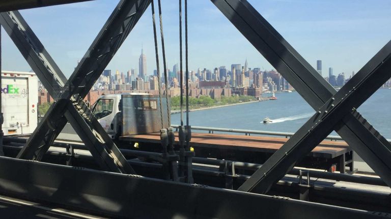 The Jamaica Line extended across the Williamsburg Bridge in 1908 to Essex Street in Manhattan. It was then extended to Chambers Street in 1913, and later to Broad Street in 1931. Between Essex Street and Broad Street, the line is known as the Nassau Street Line.