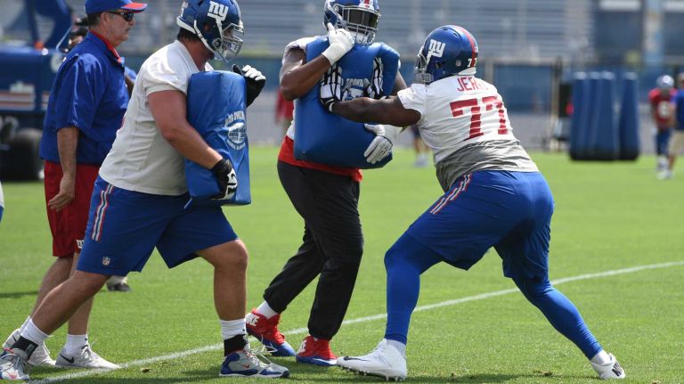 New York Giants guard John Jerry and teammates participate in a drill during the Giants Organized Team Activities at Quest Diagnostics Training Center on Wednesday, June 1, 2016.