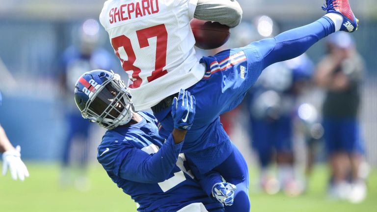 New York Giants wide receiver Sterling Shepard catches the pass against safety Mykkele Thompson during the Giants Organized Team Activities at Quest Diagnostics Training Center on Wednesday, June 1, 2016.