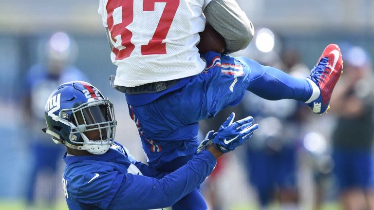 New York Giants wide receiver Sterling Shepard catches the pass against safety Mykkele Thompson during the Giants Organized Team Activities at Quest Diagnostics Training Center on Wednesday, June 1, 2016.