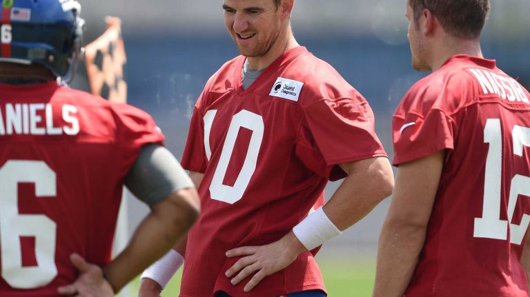New York Giants quarterbacks B.J. Daniels, Eli Manning and Ryan Nassib are seen during the Giants Organized Team Activities at Quest Diagnostics Training Center on Wednesday, June 1, 2016.