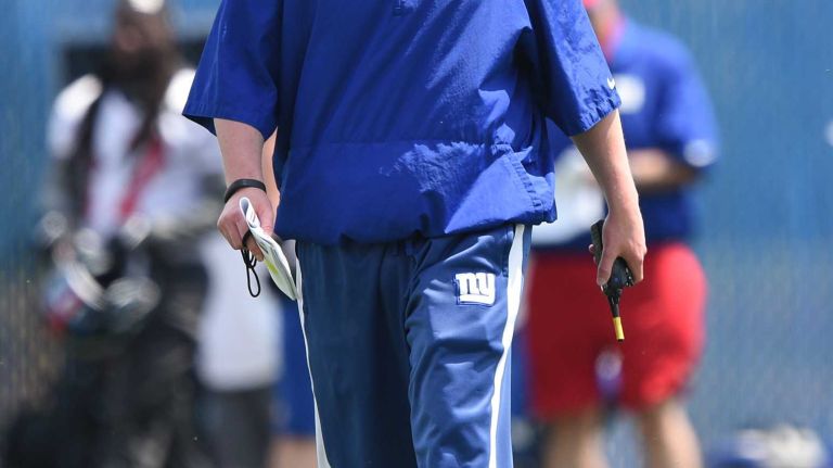 New York Giants head coach Ben McAdoo is seen on the field during the Giants Organized Team Activities at Quest Diagnostics Training Center on Wednesday, June 1, 2016.