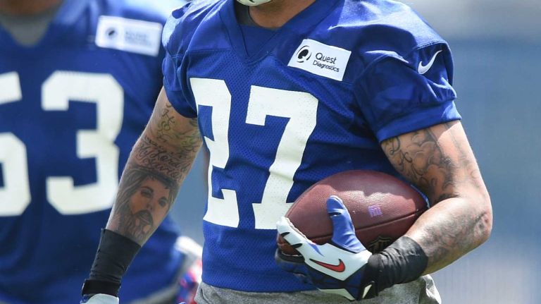 New York Giants safety Darian Thompson runs with the football during the Giants Organized Team Activities at Quest Diagnostics Training Center on Wednesday, June 1, 2016.