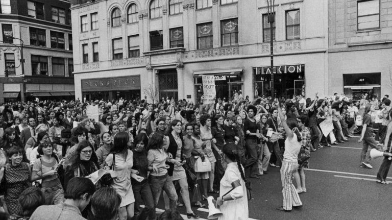 Protesters march down Fifth Avenue on Aug. 26, 1970, as part of a nationwide Strike for Equality Day. The National Women's Strike Coalition had urged women to stay away from work, avoid doing menial chores and boycott products that were deemed demeaning to women on that day.