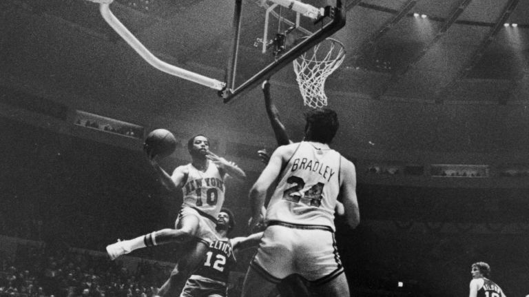 Walt Frazier, of the Knicks, goes up for a shot in the first half of Game 6 of the Eastern Conference Finals against the Boston Celtics at Madison Square Garden on April 27, 1973. The Knicks lost the game, 110-100, but won Game 7 against the Celtics. The Knicks faced the Western Conference Finals winner the Los Angeles Lakers in the NBA finals, beating the Lakers four games to one on May 10, 1973 to capture its second NBA Championship.