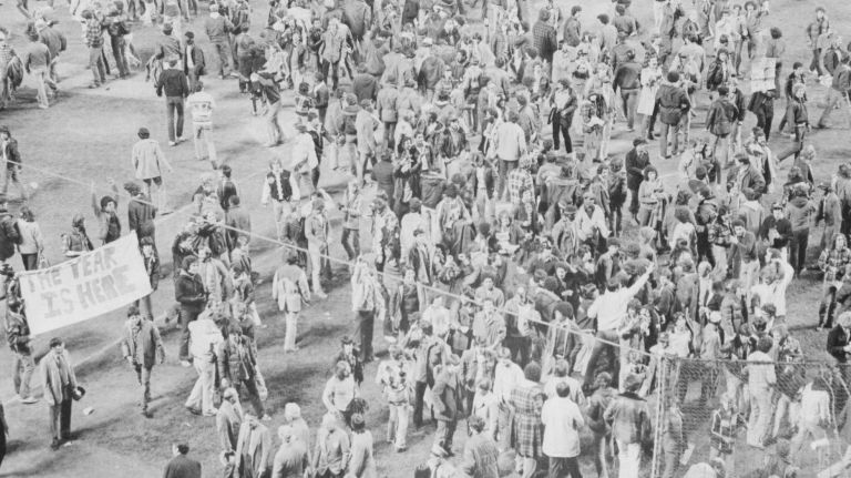 Fans celebrate on the field at Yankee Stadium after the Yankees win the World Series against the Los Angeles Dodgers in Game 6 on Oct. 18, 1977. More than 56,000 fans attended the game.