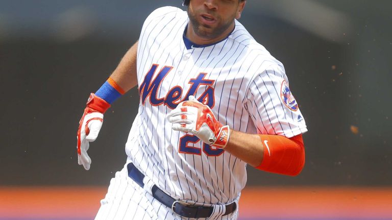 James Loney of the New York Mets scores a run in the second inning against the Chicago White Sox at Citi Field on Wednesday, June 1, 2016.