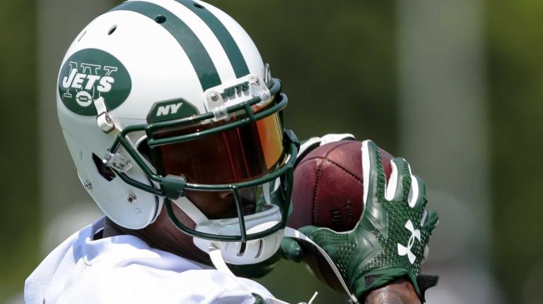 Jets receiver Brandon Marshall catches a pass during the Jets' OTAs on Wednesday, June 1, 2016 in Florham Park, N.J.