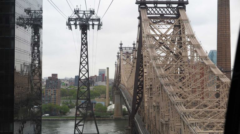 Roosevelt Island Tram facts and figures 16 The highest point on the tram is 250 feet high, which is measured from the ground to the top of the second tower. It's not quite as tall as its neighboring bridge, the Ed Koch Queensboro Bridge, which is 350 feet tall.