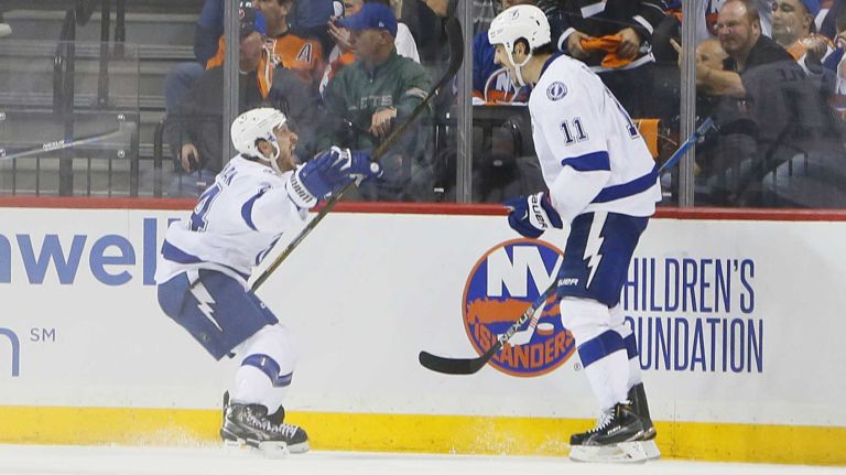 Tampa Bay Lightning right wing Ryan Callahan (24) jumps into the arms of teammate Tampa Bay Lightning center Brian Boyle (11) after the winning goal in overtime in Game 3 of the Eastern Conference semifinals against the New York Islanders on Tuesday, May 3, 2016 at Barclays Center.