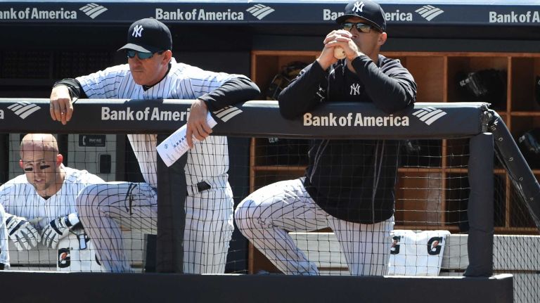 Yankees vs. Rays 63 New York Yankees manager Joe Girardi looks on against the Tampa Bay Rays during the first inning of an MLB baseball game at Yankee Stadium on Sunday, April 24, 2016.