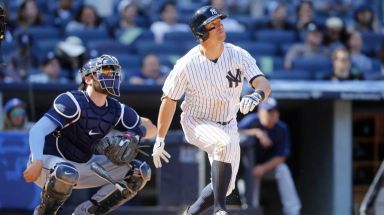 Brett Gardner #11 of the New York Yankees follows through on his ninth inning game winning home run against the Tampa Bay Rays at Yankee Stadium on Saturday, April 23, 2016 in the Bronx Borough of New York City.