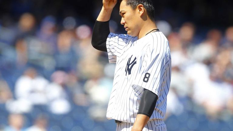 Yankees vs. Rays 91 Masahiro Tanaka #19 of the New York Yankees stands on the mound in the fourth inning against the Tampa Bay Rays at Yankee Stadium on Saturday, April 23, 2016 in the Bronx Borough of New York City.