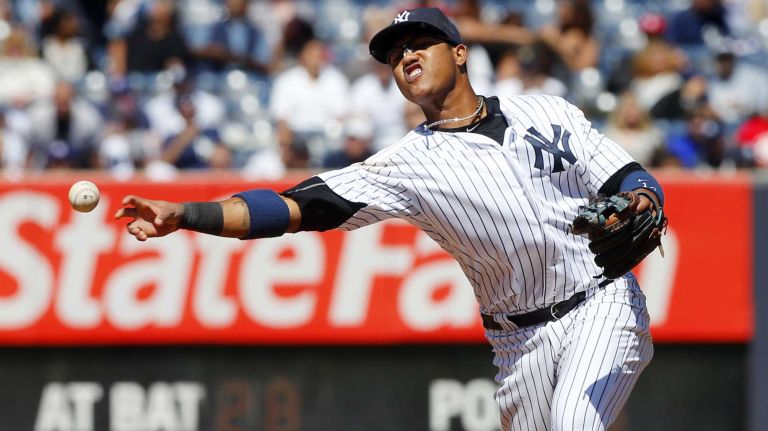 Yankees vs. Rays 95 Starlin Castro #14 of the New York Yankees throws for the first out of the fifth inning against the Tampa Bay Rays at Yankee Stadium on Saturday, April 23, 2016 in the Bronx Borough of New York City.