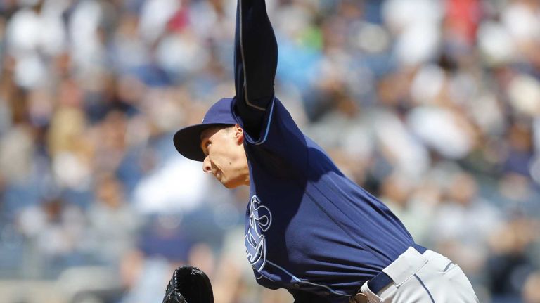 Yankees vs. Rays 107 Blake Snell #4 of the Tampa Bay Rays pitches in the second inning against the New York Yankees at Yankee Stadium on Saturday, April 23, 2016 in the Bronx Borough of New York City.