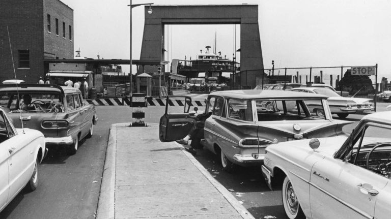 Before the opening of the Verrazano-Narrows Bridge in 1964, the main way to get to Staten Island from Manhattan or Brooklyn was by ferry. In this June 29, 1961, photo, cars wait at the dock for a ferry.