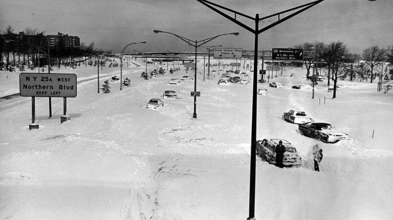 Cars stuck in snow on the Grand Central Parkway, at the Shea Stadium exit, in Queens on Feb. 10, 1969.