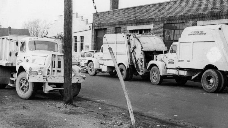 Garbage trucks sit idle at sanitation garage No. 63 near Bell Boulevard in Bayside, Queens, during a sanitation strike on Feb. 6, 1968.
