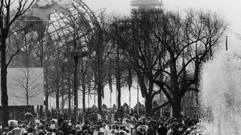 People attend the season's opening day of the New York World's Fair in Flushing Meadows-Corona Park on April 21, 1965.