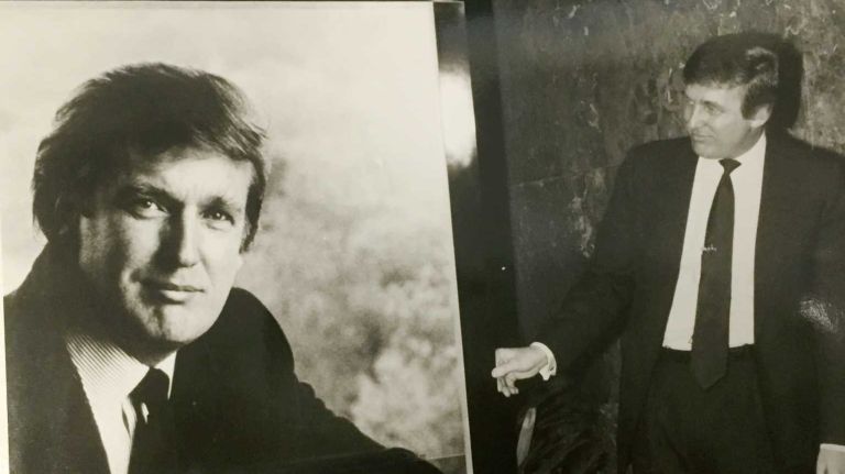 Donald Trump: See photos of the early years 8 Donald Trump with a poster to promote Trump The Game, a board game produced by Milton Bradley, Feb. 7, 1989.