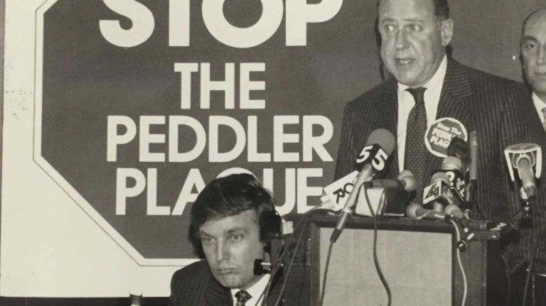 Donald Trump: See photos of the early years 10 Donald Trump, sitting, and Ira Neimark, chairman of Bergdorf Goodman, during a press conference at the St. Regis Hotel with other members of the 5th Avenue Association who wanted to put and end to the illegal peddler problem in New York City on Dec. 18, 1986.