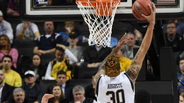 NCAA Tournament: Notre Dame vs. Michigan 16 Notre Dame Fighting Irish forward Zach Auguste sinks a basket against the Michigan Wolverines during the first round of an East Regional men's basketball game in the NCAA Tournament at Barclays Center on Friday, March 18, 2016.