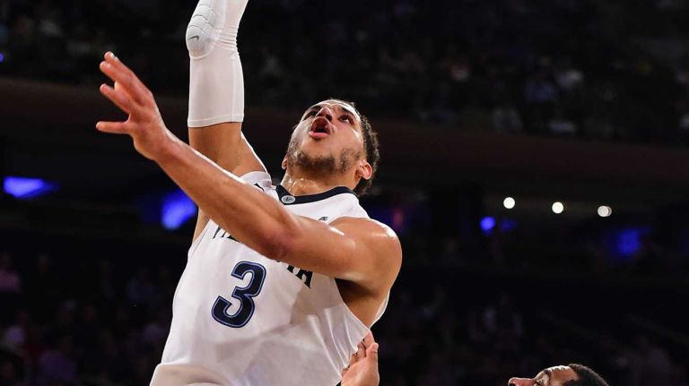 Villanova guard Josh Hart (3) attempts a shot defended by Georgetown guard D'Vauntes Smith-Rivera (4) during the Big East Tournament at Madison Square Garden in New York, New York on Thursday, Mar 10, 2016. Big East Basketball Tournament between #8 Georgetown and #1 Villanova.