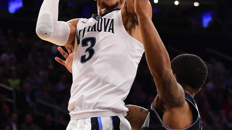 Villanova guard Josh Hart (3) drives to the basket defended by Georgetown guard D'Vauntes Smith-Rivera (4) during the Big East Tournament at Madison Square Garden in New York, New York on Thursday, Mar 10, 2016. Big East Basketball Tournament between #8 Georgetown and #1 Villanova.