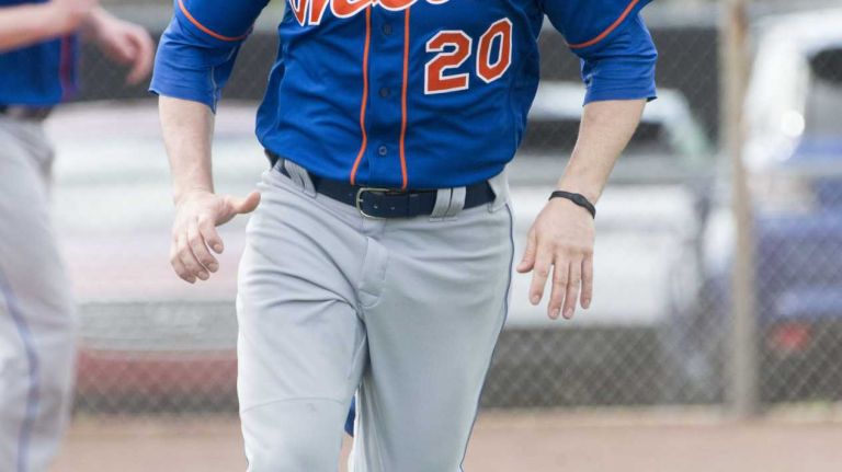 New York Mets infielder Neil Walker does running drills on Monday, Feb. 29, 2016 during a spring training workout in Port St. Lucie, Fla.