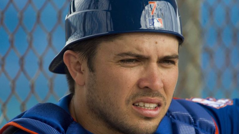New York Mets catcher Travis d'Arnaud watches drills on Monday, Feb. 29, 2016 during a spring training workout in Port St. Lucie, Fla.
