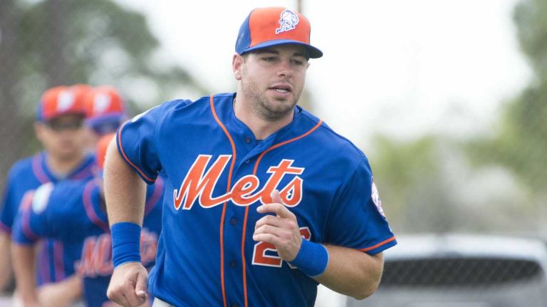 New York Mets catcher Kevin Plawecki does running drills on Monday, Feb. 29, 2016 during a spring training workout in Port St. Lucie, Fla.