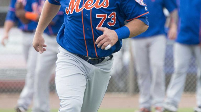 New York Mets outfielder Travis Taijeron does running drills on Monday, Feb. 29, 2016 during a spring training workout in Port St. Lucie, Fla.