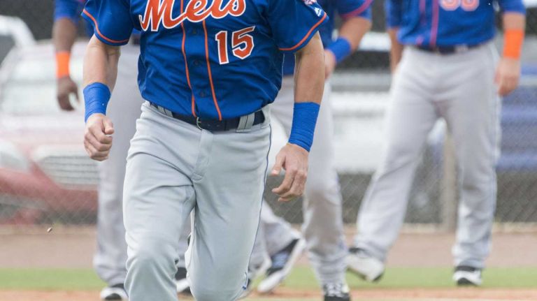 New York Mets infielder Matt Reynolds does running drills on Monday, Feb. 29, 2016 during a spring training workout in Port St. Lucie, Fla.