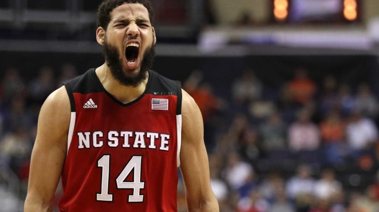 Caleb Martin #14 of the North Carolina State Wolfpack reacts after making a basket against the Duke Blue Devils during the first half in the second round of the 2016 ACC Basketball Tournament at Verizon Center on March 9, 2016 in Washington, DC. 