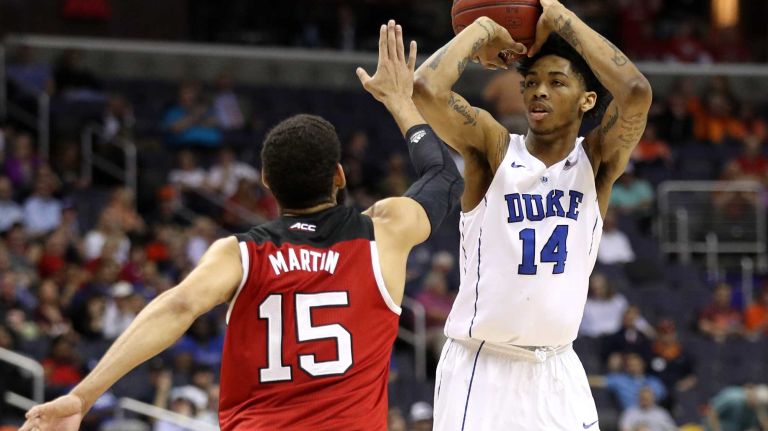 Brandon Ingram #14 of the Duke Blue Devils shoots in front of Cody Martin #15 of the North Carolina State Wolfpack during the first half in the second round of the 2016 ACC Basketball Tournament at Verizon Center on March 9, 2016 in Washington, DC.