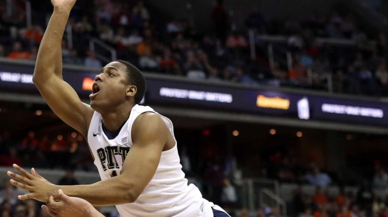 Syracuse vs. Pitt in ACC Tournament 10 Chris Jones #12 of the Pittsburgh Panthers shoots in front of DaJuan Coleman #32 of the Syracuse Orange during the second half in the second round of the 2016 ACC Basketball Tournament at Verizon Center on March 9, 2016 in Washington, DC.